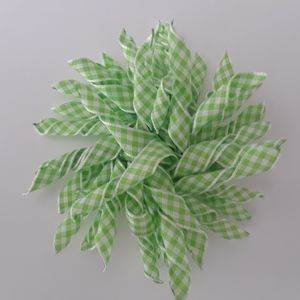 Green and white korker hair bow